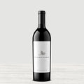 A bottle of My Favorite Neighbor Red on a gray background