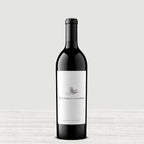A bottle of My Favorite Neighbor Red on a gray background