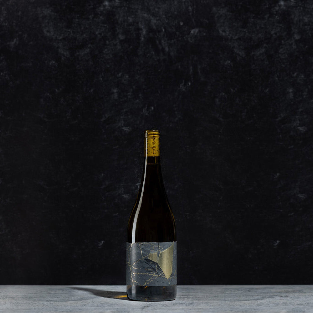 bottle of the white wine bottle Friction on a black background 