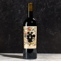 Wine bottle with an abstract label on a dark background