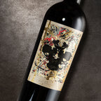Wine bottle with a decorative label on a dark background