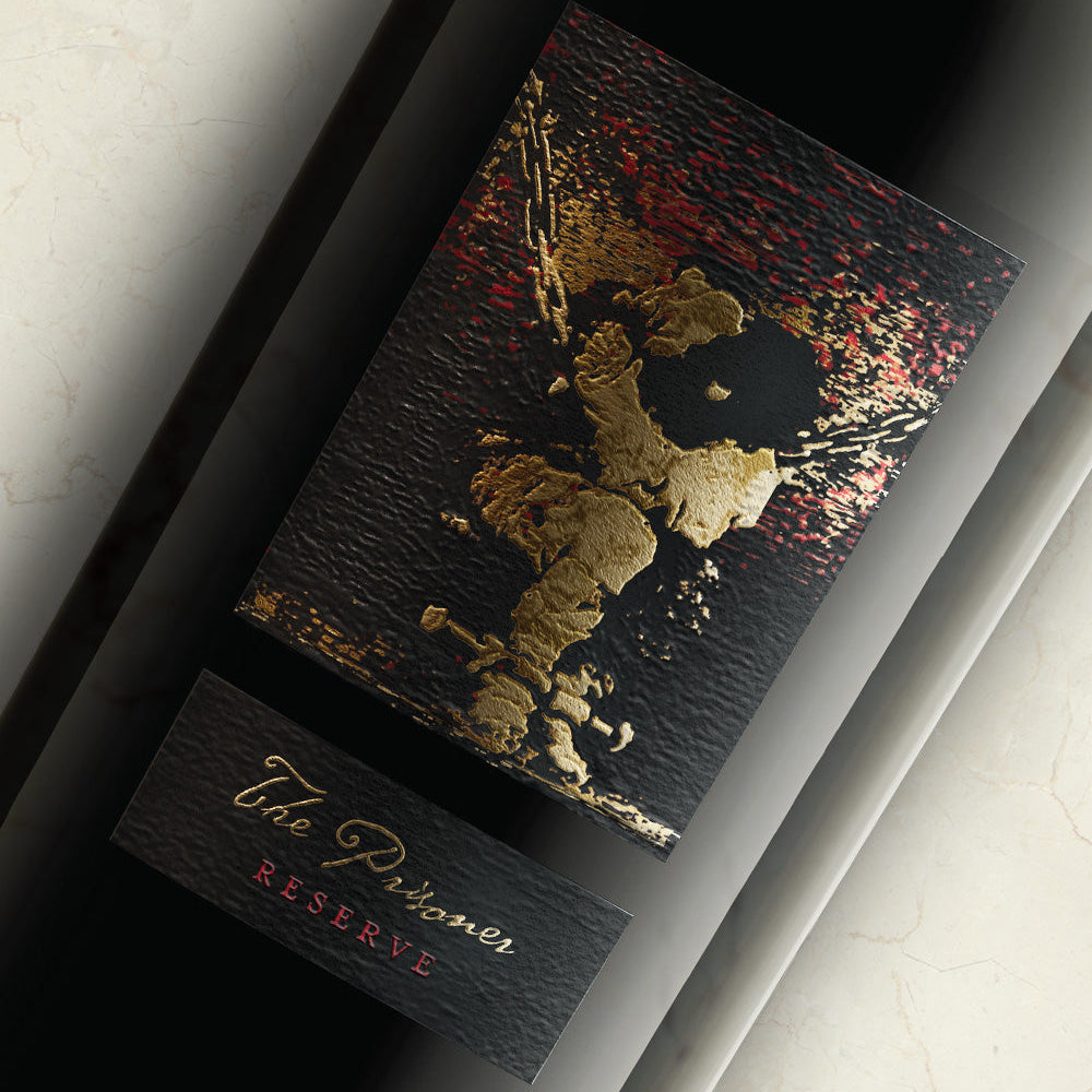 A closeup of the label of a bottle of The Prisoner Reserve Red Blend 