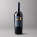A bottle of Robert Mondavi Winery The Estates Cabernet Sauvignon Oakville on a gray background