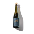 Bottle of sparkling wine against a white background