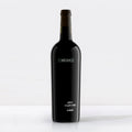A dark glass wine bottle with a black label reading 'SALDO' and 'ORSI Vineyard Syrah' near the bottom, photographed against a clean white background.
