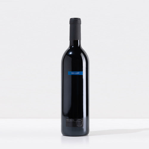 A bottle of SALDO Red Blend on a light gray background