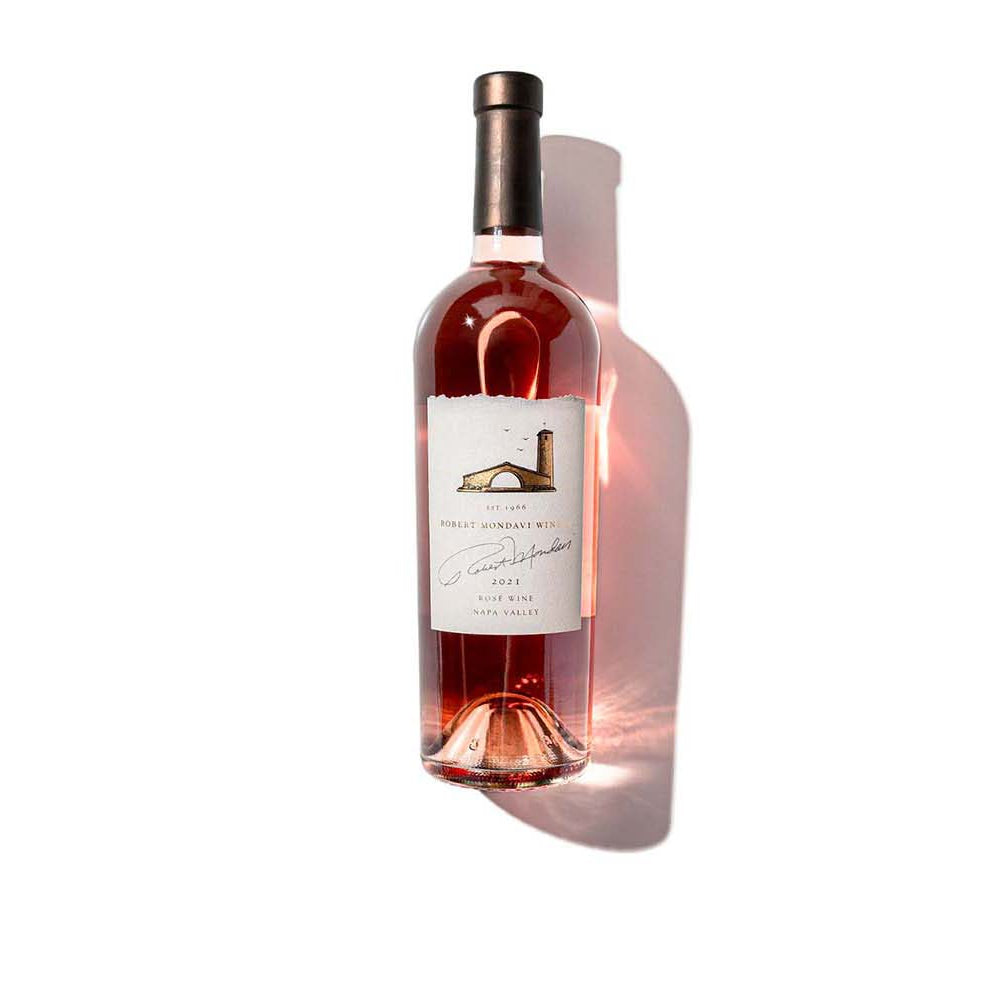 Bottle of Robert Mondavi Winery Rose wine with a label on a white background